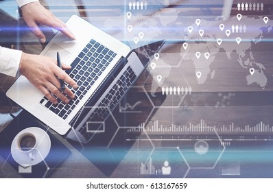 Concept Of Digital Screen,virtual Connection Icon,diagram,graph Interfaces.Businessman Working With Laptop At Office.Modern Notebook,cup Of Black Coffee On Wooden Table.Reflections On Glass Surface