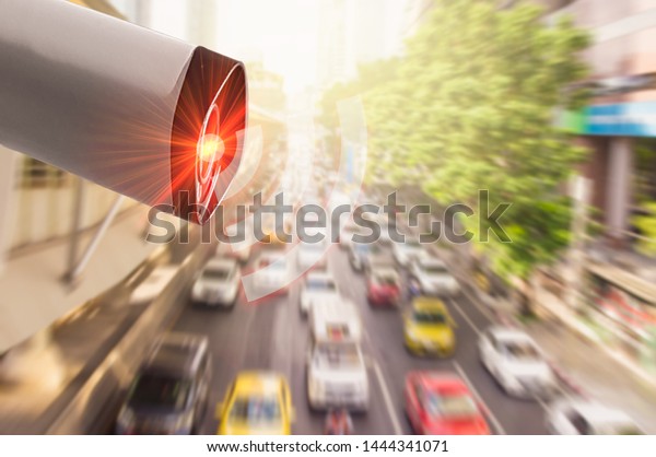 Concept digital technology 4.0,wireless network\
5G signal,CCTV  camera intelligent of artificial intelligence\
systems, to monitor road safety and memorize driver\'s driving\
behavior and illegal\
traffic
