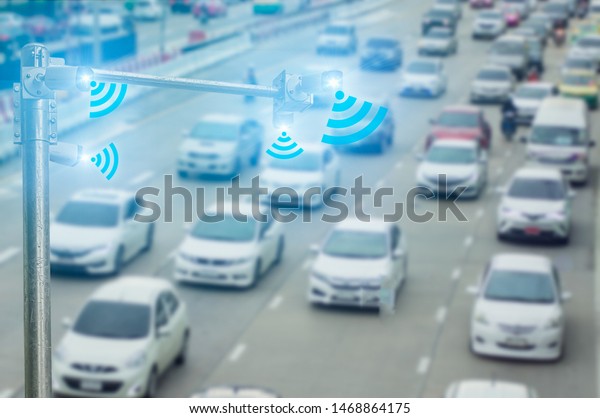 Concept digital technology 4.0,wireless network\
5G signal,CCTV  camera intelligent of artificial intelligence\
systems, to monitor road safety and memorize driver\'s driving\
behavior and illegal\
traffic
