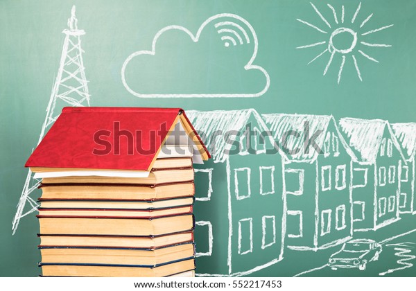 The concept of distance education with books and\
chalk drawing