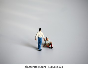 The Concept Of Domestic Violence. Miniature People.