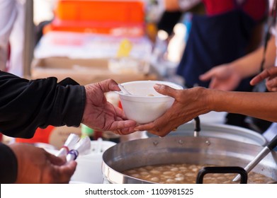 Concept Of Donation Feeding The Poor To Help Each Other In Society