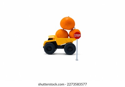 Concept for don't overload when bringing stuff. A photo after some edits, a yellow truck brings some oranges and flipped over.