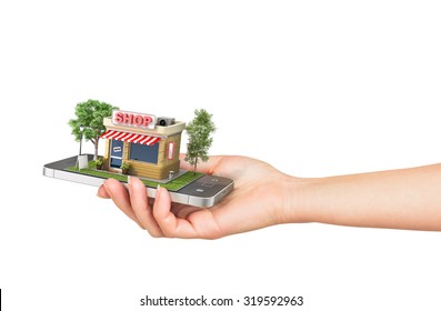 Concept of e-commerce. Hand holding mobile phone with shop in the display on a white background. Online store.