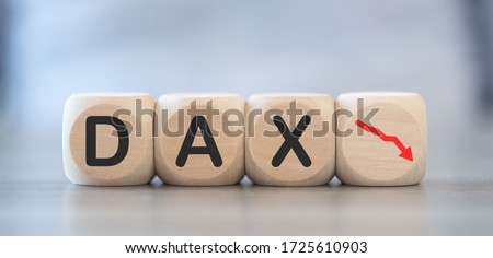 Concept of economic crash with dax drop on wooden cubes