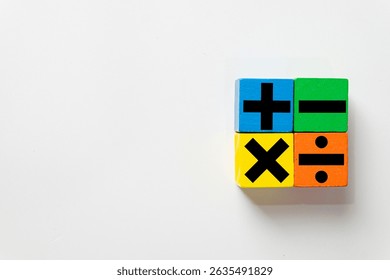 Concept for education, learning arithmetic, school, numeracy, and teaching mathematics,business,financial.,wooden blocks displaying basic mathematical operation symbol(plus,minus,multiply, divide).