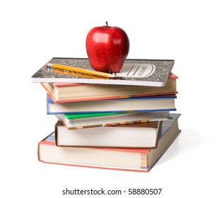 Concept of education. A red apple and pencil sitting on top of a stack of school books. - Powered by Shutterstock