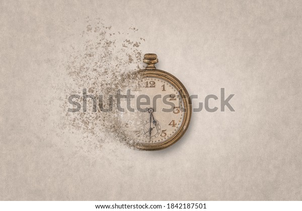 Concept of end of time\
or time flying. Ancient clock on a clear background disintegrates\
into small pieces.