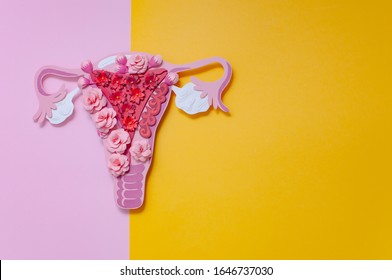The concept of endometriosis of the uterus. Diseases of the female reproductive system. Health and disease are a beautiful art concept made of paper. Copyspace