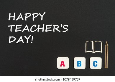 Concept English School, Text Happy Teacher's Day, Abc Letters, Chipboard Miniature Book, Pen On Blackboard