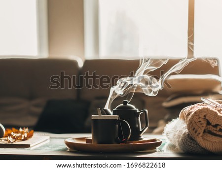 
the concept of enjoying coffee at home, spending time at home