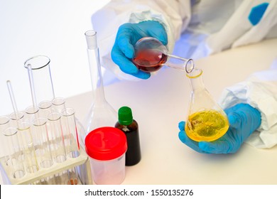 Concept - Epidemiology. Epidemiology Studies. Laboratory Assistant Works With Analyzes. Bacteriological Studies. Epidemiology Of Infectious Diseases. Scientists Study Analyzes Received. Test Tubes.