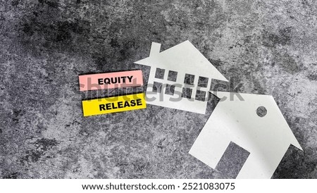 Concept of Equity Release write on sticky notes isolated on Wooden Table.