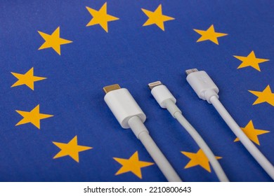 Concept For EU Law To Force USB-C Chargers For All Phones. EUROPEAN UNION Flag And USBC Universal Charging Cable As A Standard For Small Electronic Devices