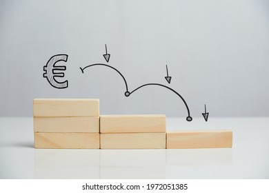 Concept Of Falling Euro Sterling Currency Rate On Stairs With Downward Arrow.