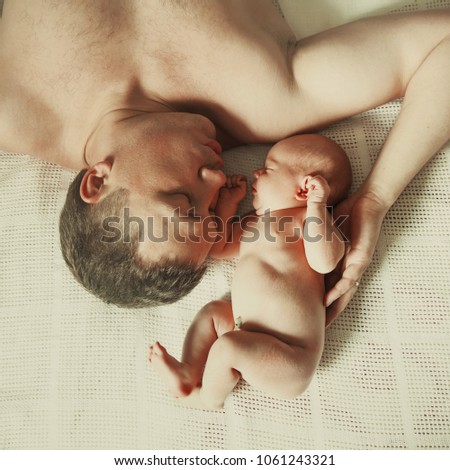 Similar – Newborn sleeping lying on blanket