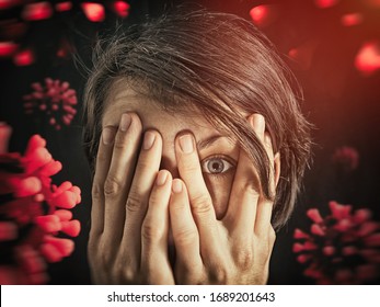 Concept Of Fear Of Coronavirus. Woman Covers Her Face Her Hands On Background With Coronavirus.