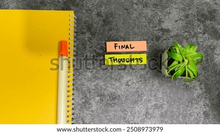 Concept of Final thoughts write on sticky notes isolated on Wooden Table.
