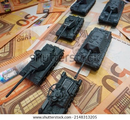 The concept of financing war and armaments.
