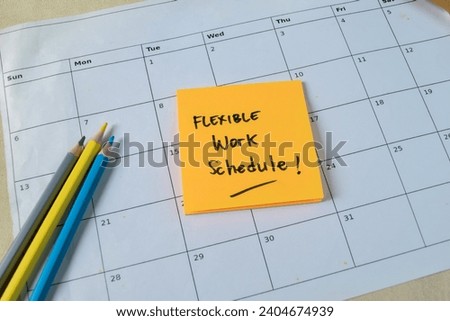 Concept of Flexible work schedule write on sticky notes isolated on Wooden Table.