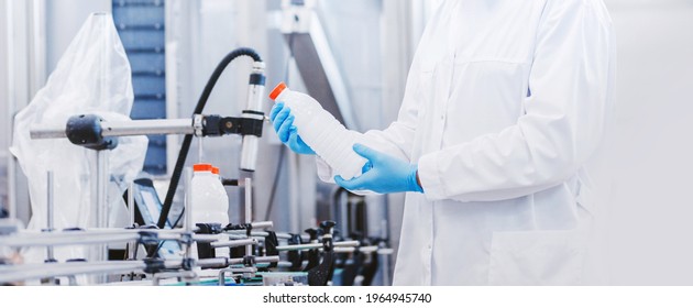 Concept Food Industry Banner. Worker Inspecting Production Line Bottle In Of Beer Or Dairy Factory.