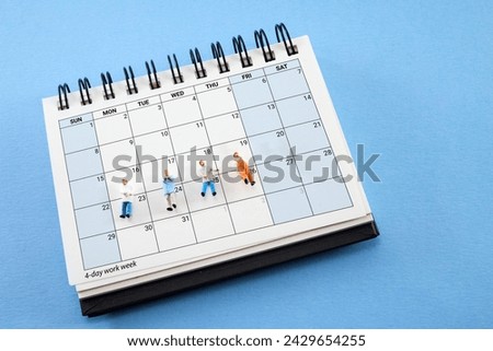 Concept of four-day work week. Printed calendar for a 4 day working week