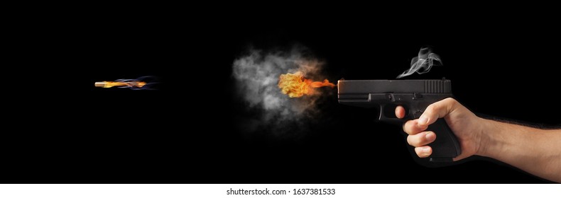 concept of freezing shot of a gun on a dark backgroundFreezing shot of a gun on a dark background. Concept gun club, gun-shop, shooting range.