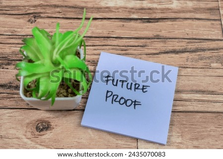 Concept of Future Proof write on sticky notes isolated on Wooden Table.