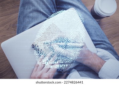 Concept of the future of security and password control through advanced technology. Fingerprint scan provides safe access with biometrics identification. Multi exposure.