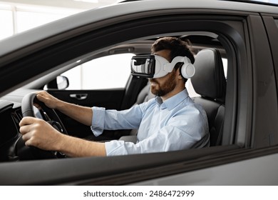 Concept of future technology in automotive industry, virtual driving, innovation, and immersive experiences. Man wearing virtual reality headset sitting in car testing simulation. - Powered by Shutterstock