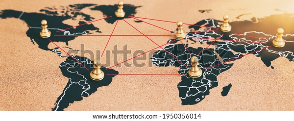 concept of geopolitics or worldwide economy. chess\
figures placed on map\
banner