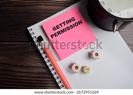 Concept of Getting permission write on sticky notes isolated on Wooden Table.