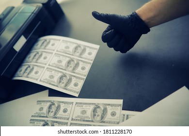 The Concept Of Global Economic Crisis. Illegal Production Of US Dollars. Print Money Underground. Printing Hundred Dollar Bills By A Criminal.