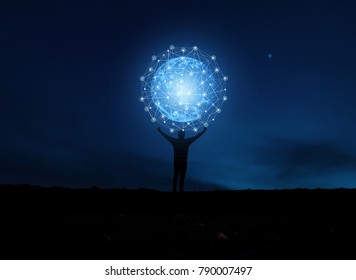  concept global network connection in hands on night sky background / soft focus picture / Blue tone concept
