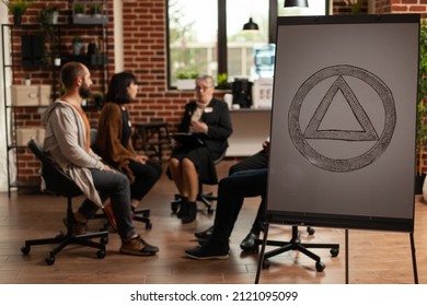 Concept Of Group Therapy Session With Alcoholic People And Aa Meeting Sign On Board, Indicating Community Rehabilitation With Psychologist To Give Guidance And Advice. Specialist Counseling