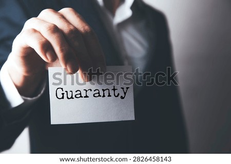 Concept of guaranty write on sticky notes 