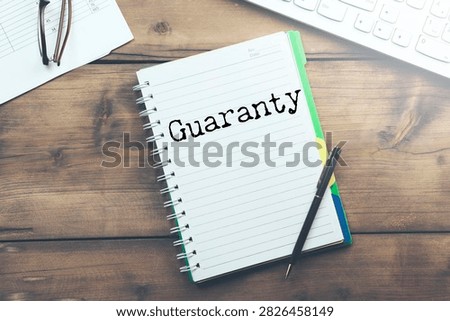 Concept of guaranty write on sticky notes 