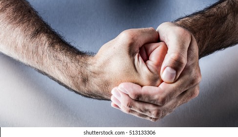 concept of hand gesture for symbol of courage, power, conviction, union or impatience with both fists together for positive fighting communication and body language