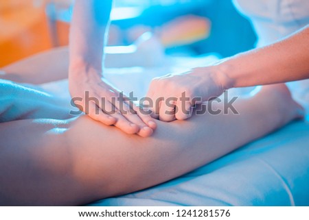 Similar – Female receiving treatment by professional osteopathy therapist