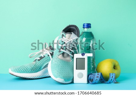 Concept of a healthy diabetic on mint background. Sports diabetic