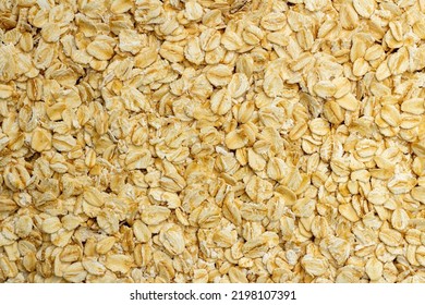 Concept Of Healthy Grain, Background Of Oat Flakes Or Oats Cereal With Healthy Food.