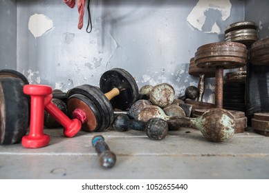 Concept - Healthy Lifestyle. Old Retro Dumbbells Are Lying On The Floor In A Boxing Gym, Sports Gear, Copyspace