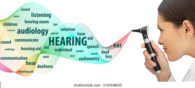 Concept of hearing exam, hearing test and ear treatment. Doctor holding otoscope and looking on sound waves.