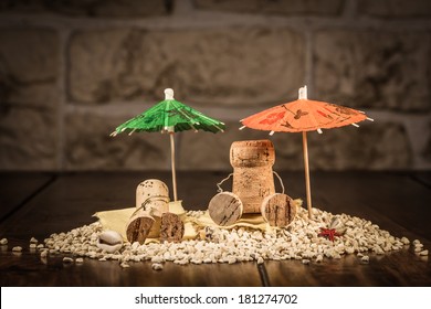 Concept Holiday On A Beach With Wine Cork Figures