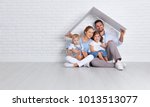 concept housing a young family. mother father and children in a new home
