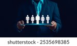 Concept of human resource management,Customer relationship management,HRM, personnel recruitment, HR, personnel selection, leadership.Businessman show human resources with icon with virtual screen.