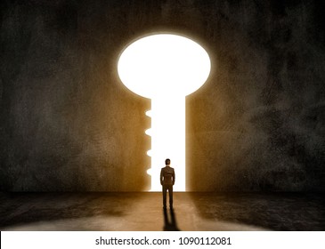 Concept idea,Businessman men wearing black suit standing in a room.Look at the key door of success. - Shutterstock ID 1090112081