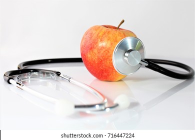 An concept image of a apple and a stethoscope