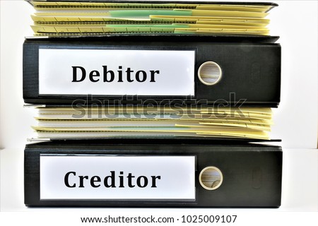 An concept Image of a binder with copy space - Debitor, creditor