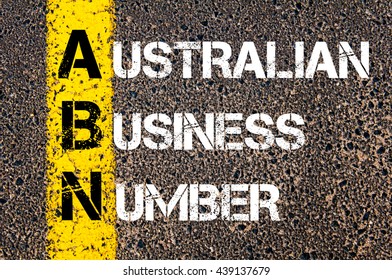 Concept image of Business Acronym ABN Australian Business Number written over road marking yellow paint line